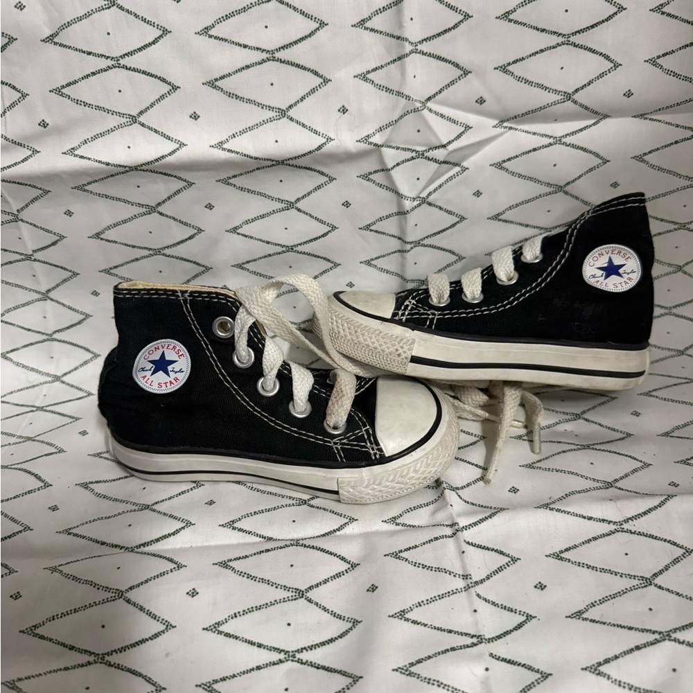 Converse Black and White High-Top Sneakers with Yellow Tongue